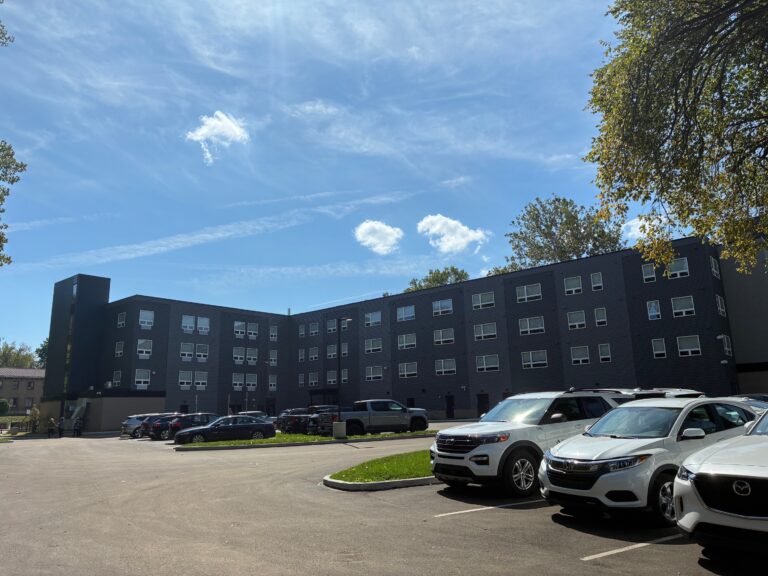 Rear of the Hitchcock Center for Women with resident parking and landscaped grounds